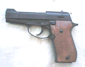 Blank firing hand gun.